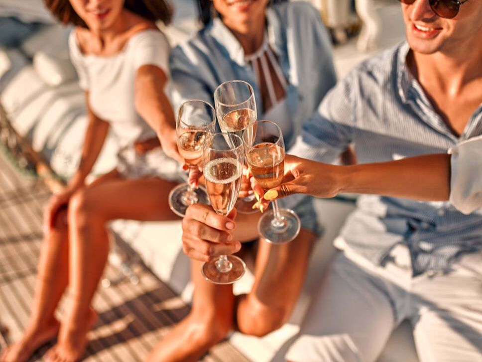toasting champagne on a yacht